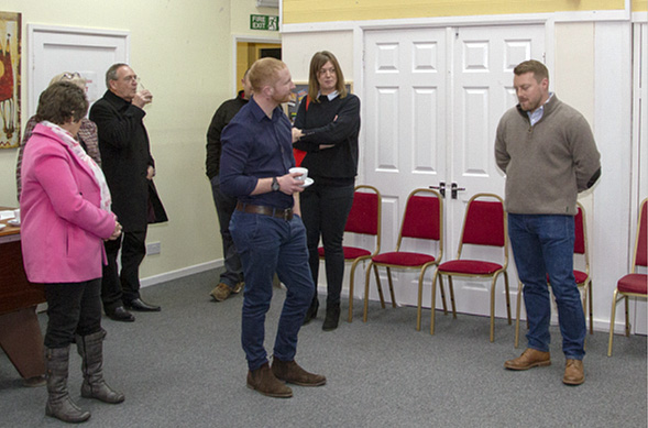 Ross McMillan (far right) addresses guests of ‘About with Friends’ at the Grand Switch On