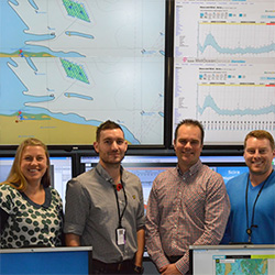 Rebecca Callister, Karl Butler, Russell Hill and Ross McMillan in the Marine Coordination Centre at Wind Farm Place, the operating base for Sheringham Shoal